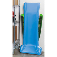 Slide folded leaning against a white wall 