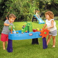 Children playing with water table 