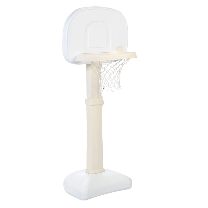 Sideview of white and beige basketball set on a white background