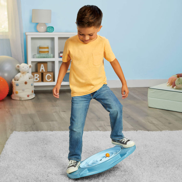 Boy using balance maze