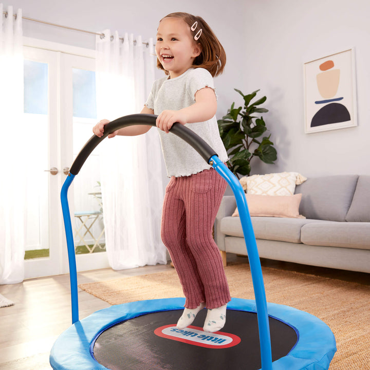 girl jumping on trampoline