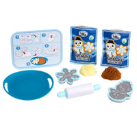 Toy baking set with cookie mix, tools, and a recipe card on a white background