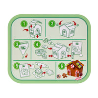 Step-by-step guide for building a gingerbread house on a green tray with white background