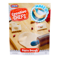 Little Tikes Creative Chefs Pasta Dough packaging with dough, tools, and branding on a white background.
