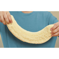 Boy holding a large piece of the vanilla dough