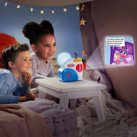 Two children sitting on a bed with a Little Tikes toy and a nightlight.