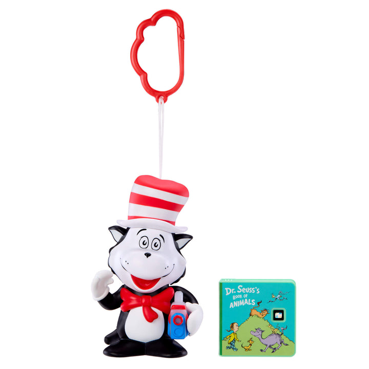 Toy figure of a cat in the hat with a book on a white background