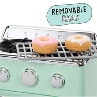 A mint green oven with a removable metal rack holding two frosted donuts, on a white background with a light blue callout bubble reading 'REMOVABLE RACK'.