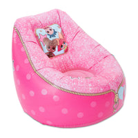 Side view of chair that is pink with circles