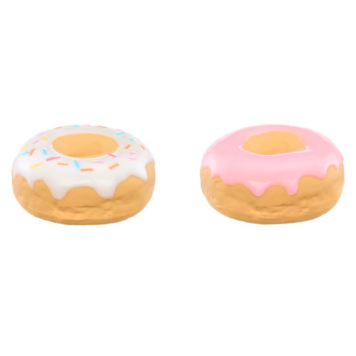 Two donut-shaped toys  with different toppings on a white background