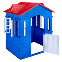 A blue plastic playhouse with a red tiled roof, white open door, and white window shutters, shown on a plain white background.
