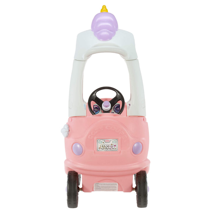 A pink and white toddler ride-on toy car with a horn, steering wheel, shown against a plain white background.