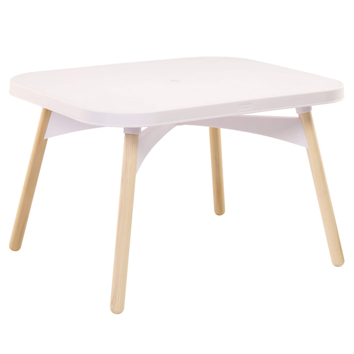 A modern low table with a white rectangular top and four light natural wood legs, shown on a solid white background.