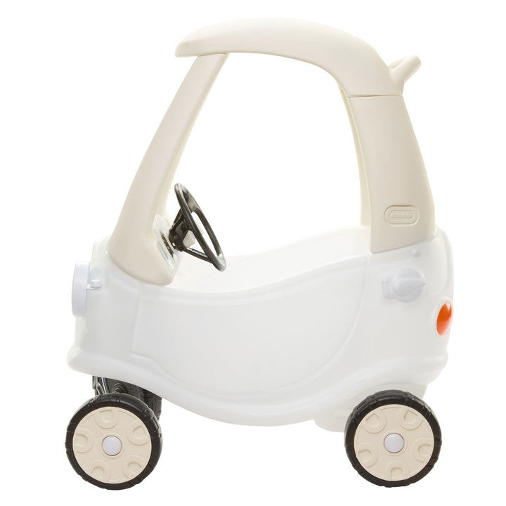 Side view of the White Cozy Coupe with light beige roof on a white background