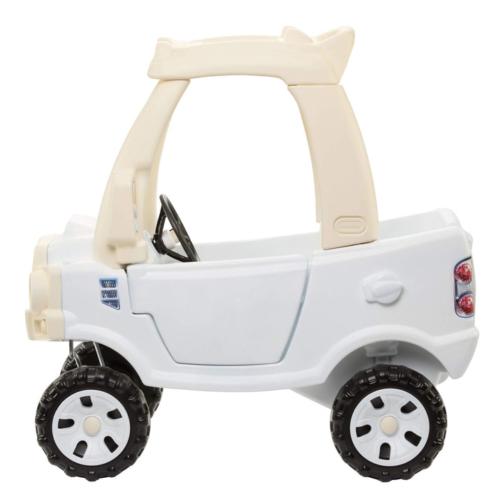 Sideview oth the White Cozy Truck  beige roof, black wheels with white hubcaps on a white background