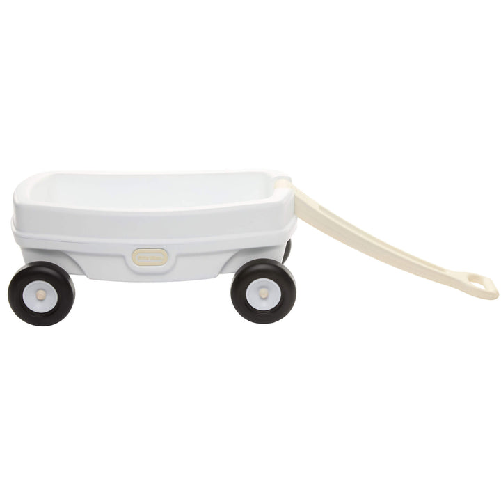 White wagon with black wheels, white hub caps and beige handle on a white background
