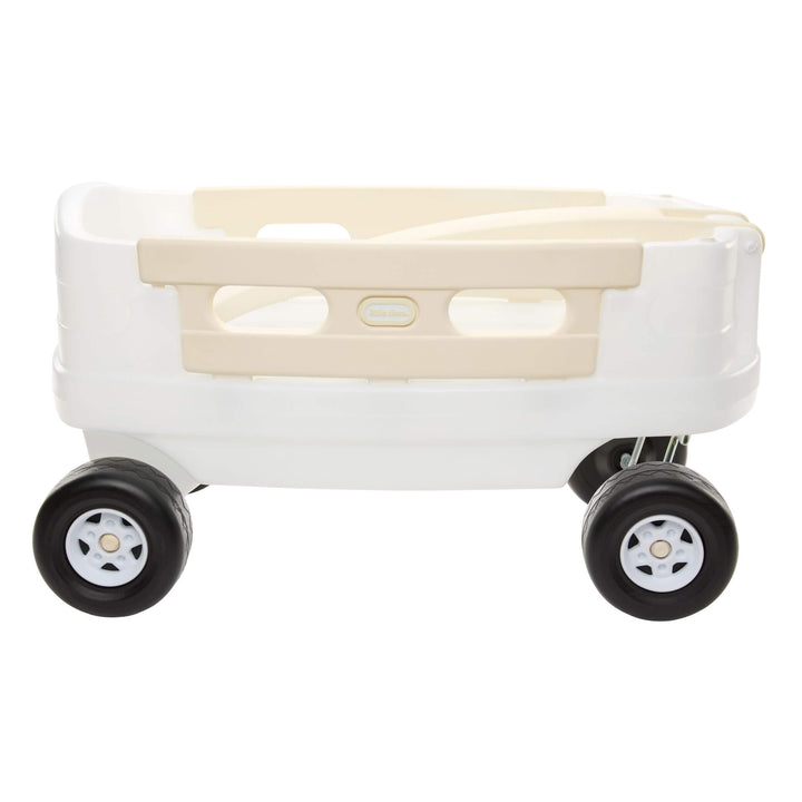 Sideview of white wagon and beige  side rail on a white background