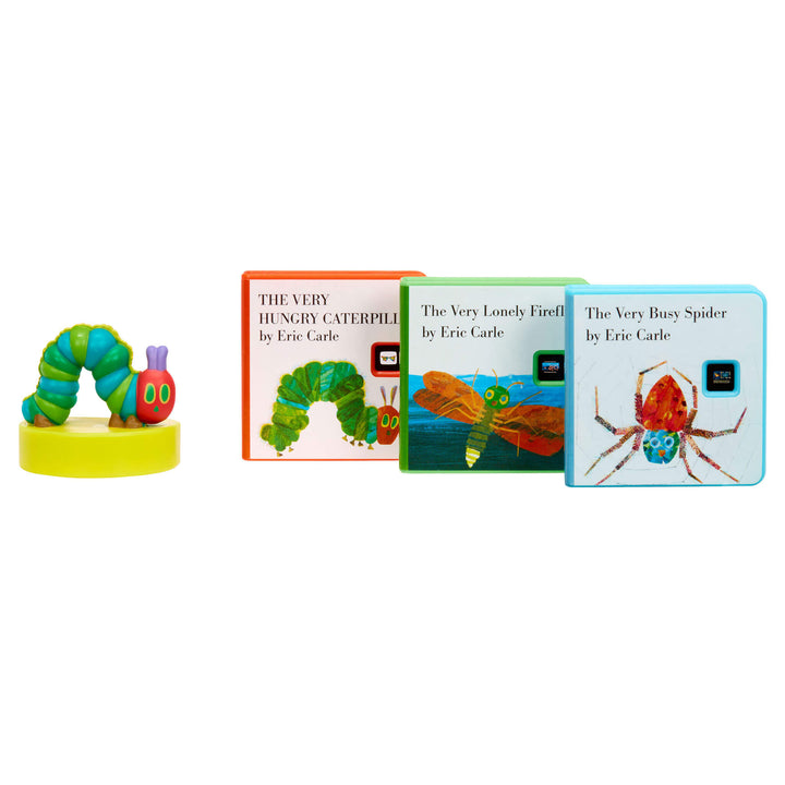 Three Eric Carle illustrated books and a matching small Caterpillar figurine on a yellow base, photographed on a plain white background.