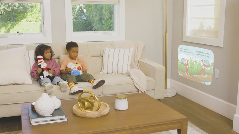 Various Kids playing with Dr. Seuss  Story Dream Machine from Little Tikes