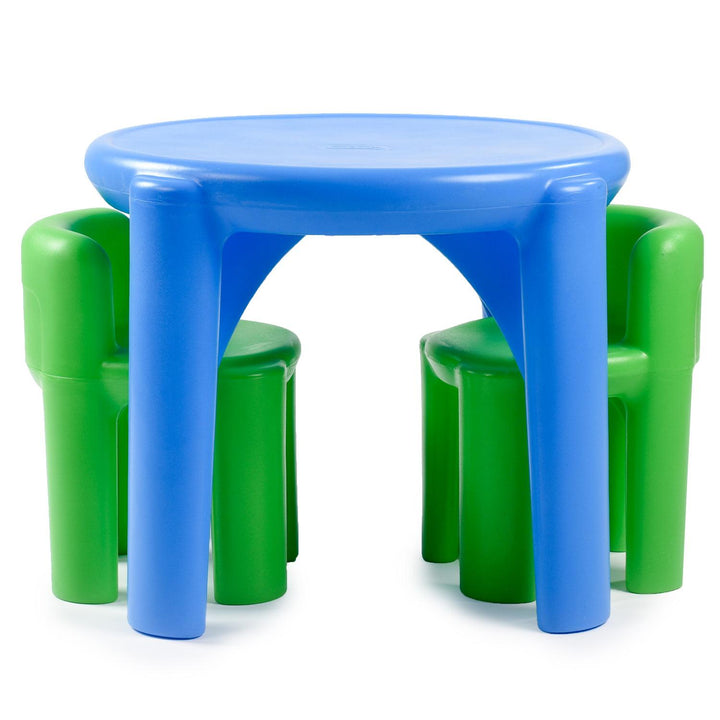 Blue table with two green chairs