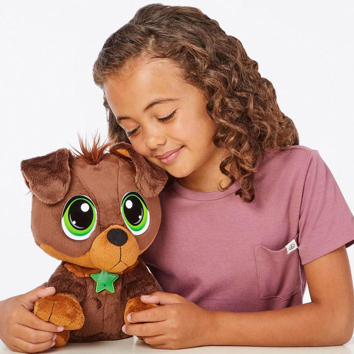 girl holding the toy dog