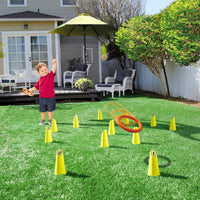 Take turns tossing the rings onto the cones. Players score points for each successful ring that lands around a cone